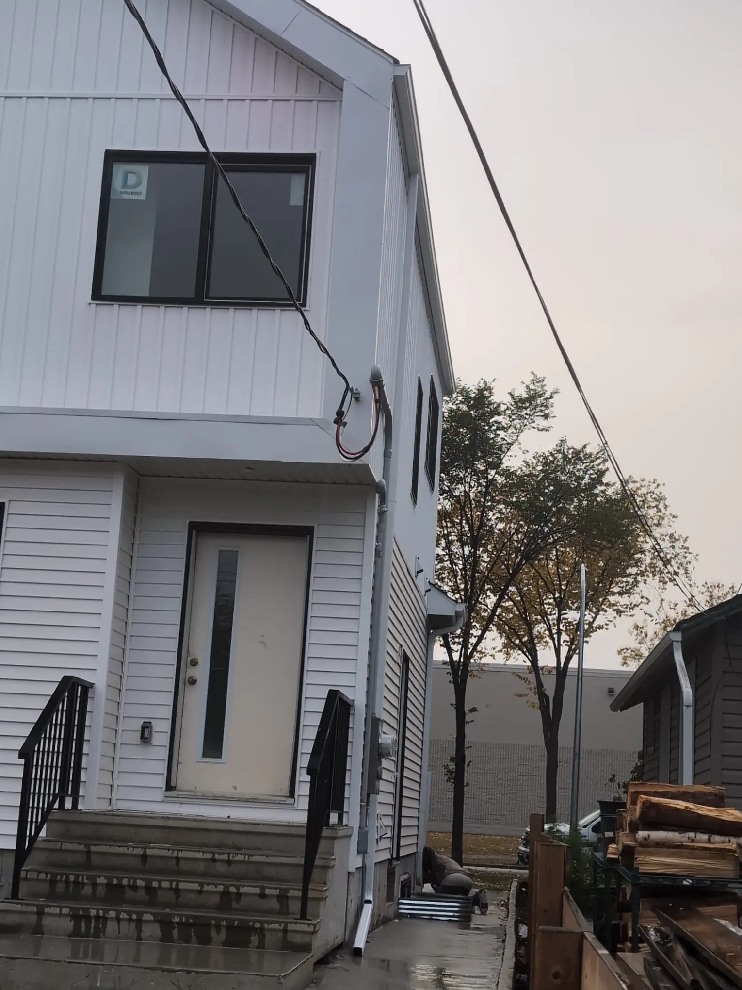 ACR Construction white board and batten siding on new build home